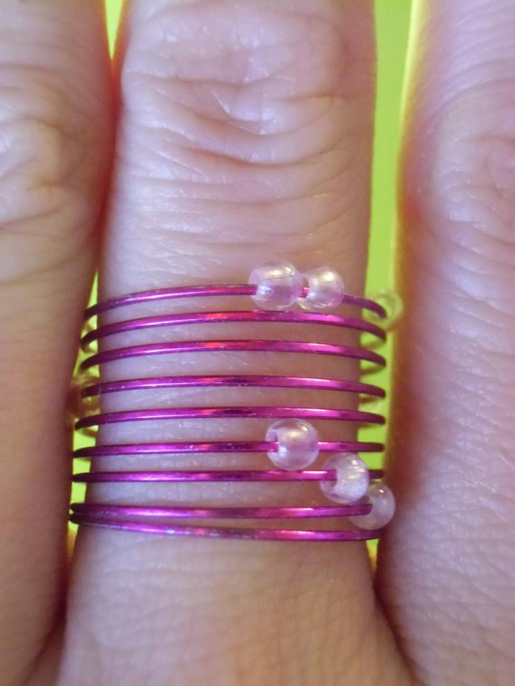 Bild 2: pinklilaner Ring mit durchsichtigen Perlen