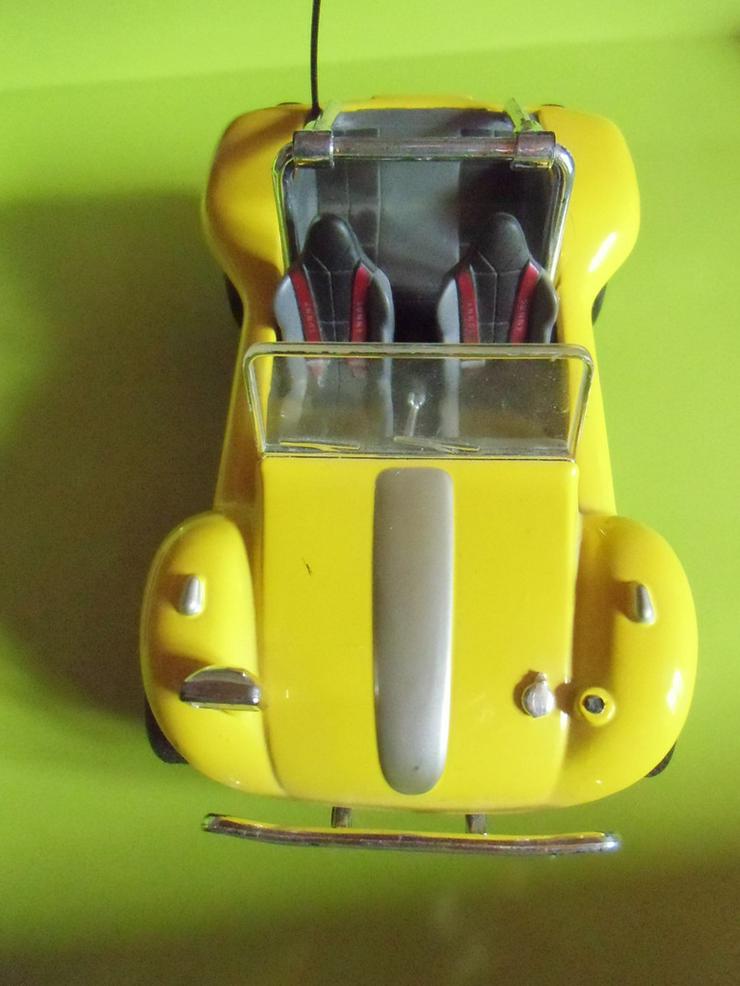 Bild 2: gelbes Auto mit Rückziehmotor