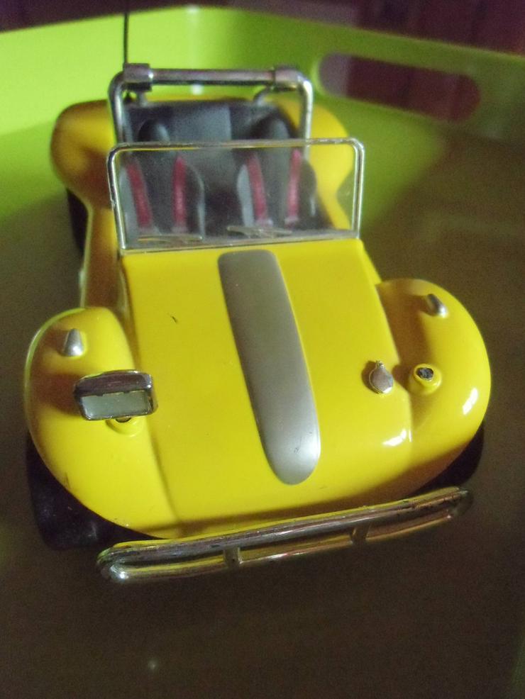 Bild 3: gelbes Auto mit Rückziehmotor