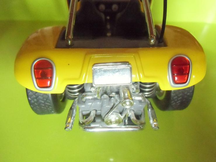 Bild 5: gelbes Auto mit Rückziehmotor