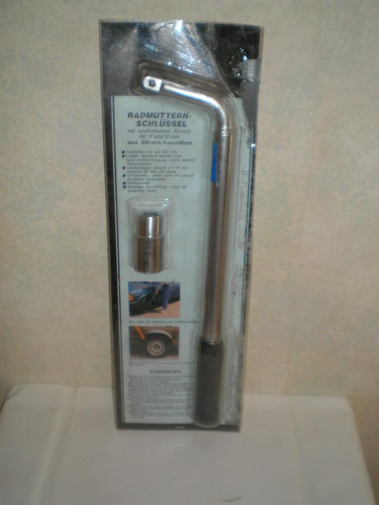Bild 2: Handlampe, Radschlüssel, Warmwasser, Ladegerät