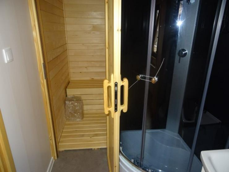 Bild 14: Mobilheim Holz mit sauna wohnwagen dauercamping
