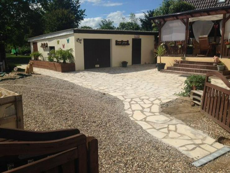 Bild 8: Natursteine Polygonalplatten Fassade Terrasse Einfahrt