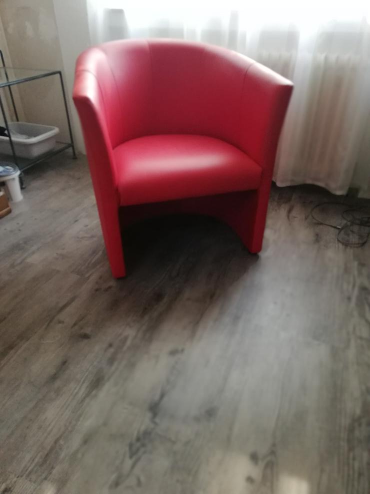 1 roten Sessel