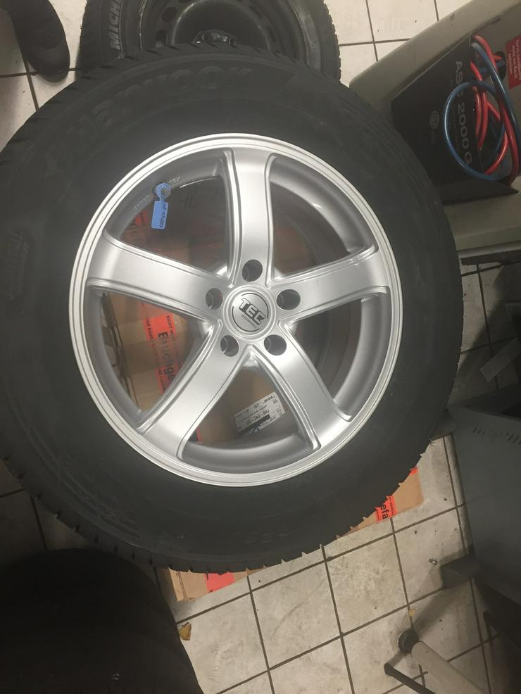 Bild 9: Vier Hankook Winterreifen 235/65R17 108V