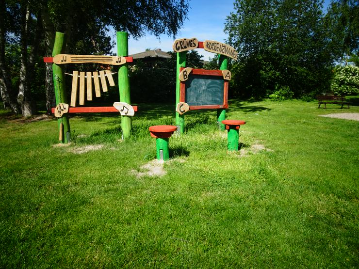 Bild 1: Spielplatzgestaltung, Freiraumgestaltung aus Holz (Schaukeln,Wippen,Baumhaus,Klettergerüst)