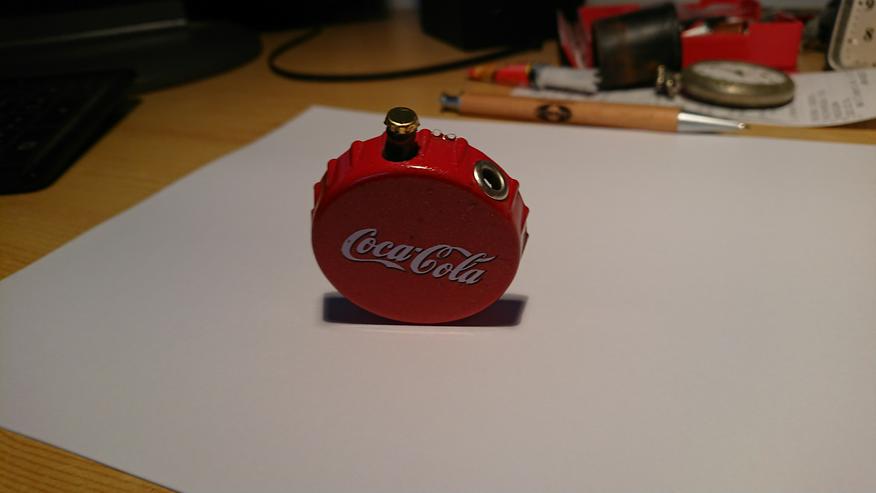 Bild 4: Coca Cola Feuerzeug und Öffner 