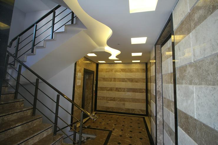 Sonnige und moderne 2 Zimmer-Wohnung mit Balkon und Einbauküche in Mahmutlar - Wohnung kaufen - Bild 2