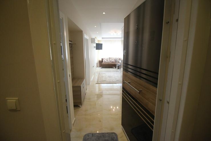 Sonnige und moderne 2 Zimmer-Wohnung mit Balkon und Einbauküche in Mahmutlar - Wohnung kaufen - Bild 3