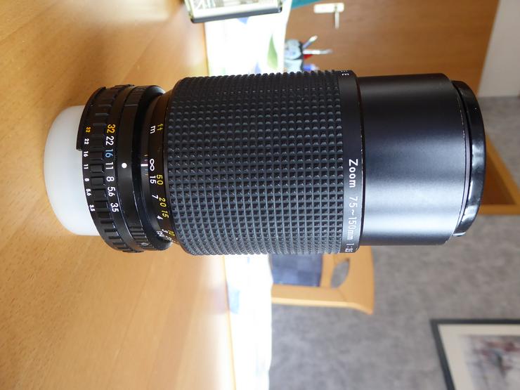 Spiegelreflexkamera Nikon EM mit 35 mm Objetiv + Zoom 75 : 150 mm  - Analoge Spiegelreflexkameras - Bild 4