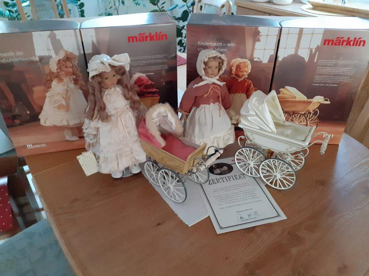 Bild 9: Märklin Puppen mit/ohne Zertifikat sowie Puppenwagen