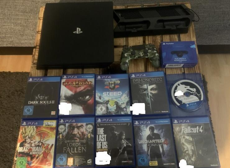 Playstation 4 1TB Pro + 9 Spiele + Ladestation + Scuf Adapter