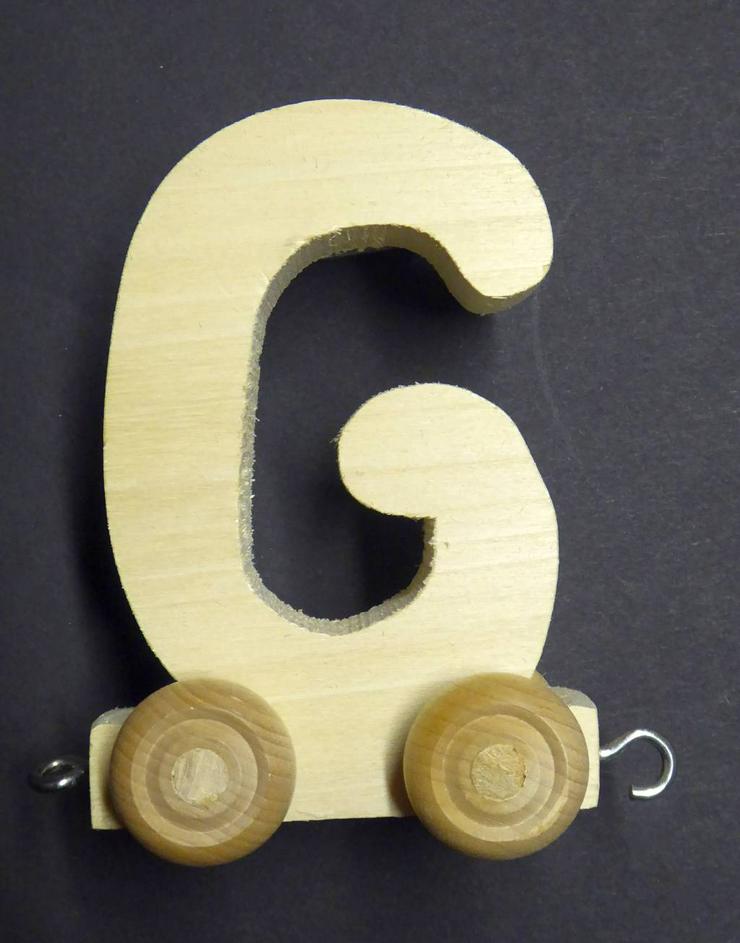 Bild 4: einzelne Naturholzbuchstaben 9 x 5 cm  mit Rädern