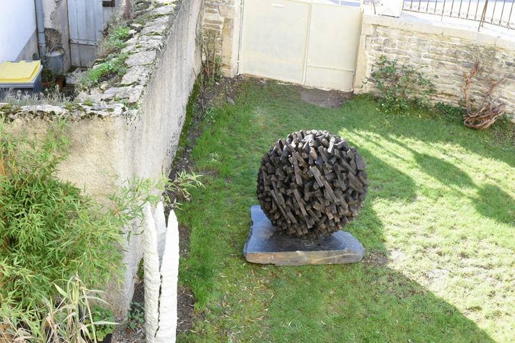 Bild 9: Skulptur aus Holz Garten Terrasse Pool