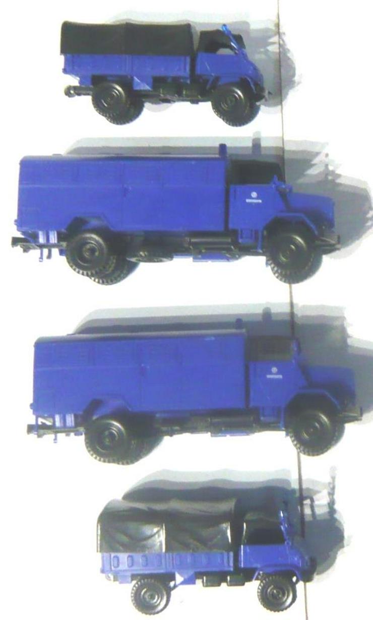 Bild 5: Roco 1: 87 THW Zug 2x MAN und 2x Unimog im Set