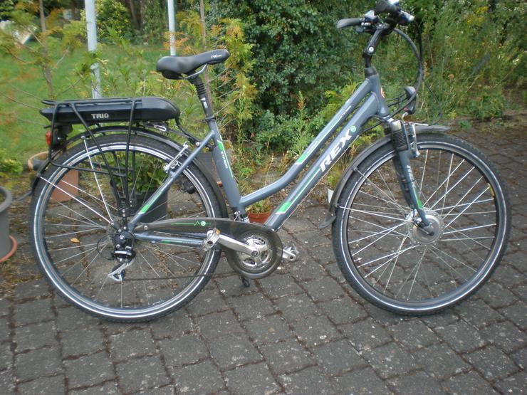 21-Gang Rex Elektrotreckingrad - Elektro Fahrräder (E-Bikes) - Bild 1