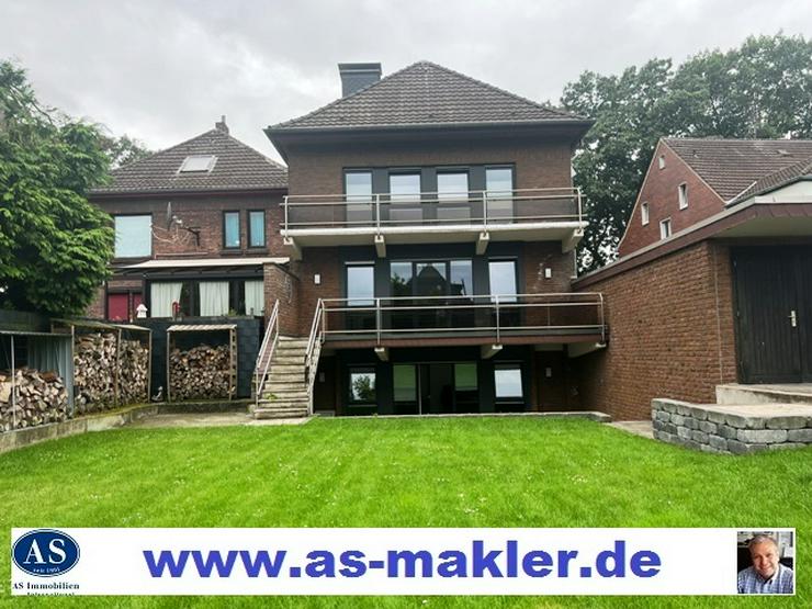 Luxuriöses Einfamilienhaus mit Einliegerwohnung, moderner Ausstattung und idyllischem großem Garten frei!!! - Haus kaufen - Bild 1