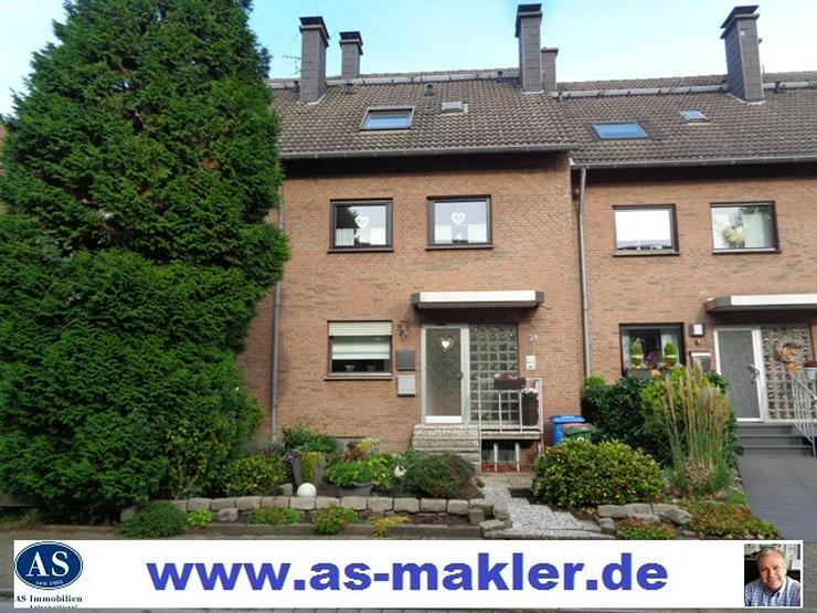 Selbstnutzer., Maisonette-Wohnung mit Garten und 2 Garagen im Zweifamilienhaus