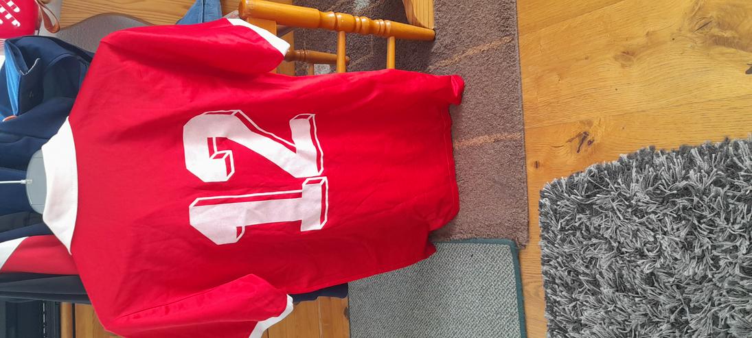 Bild 2: 11 Halbarm Trikots gr.7/8