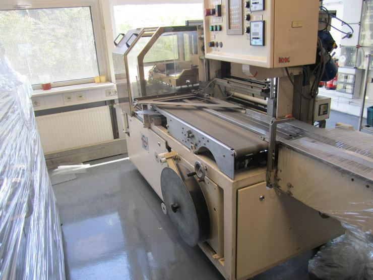 Bild 7: Verpackungsmaschine Folieranlage mit Schrumpftunell