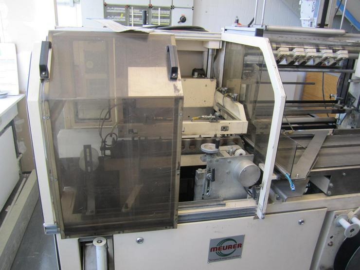 Bild 8: Verpackungsmaschine Folieranlage mit Schrumpftunell