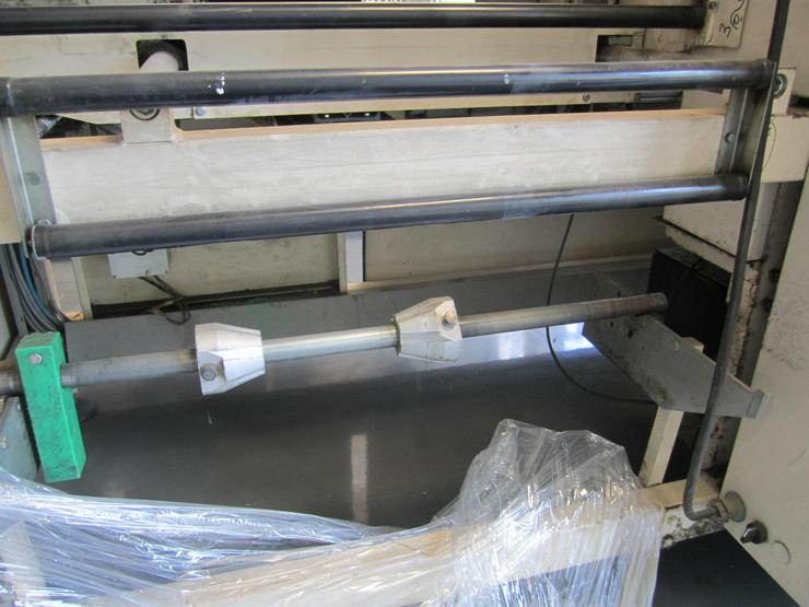 Bild 14: Verpackungsmaschine Folieranlage mit Schrumpftunell
