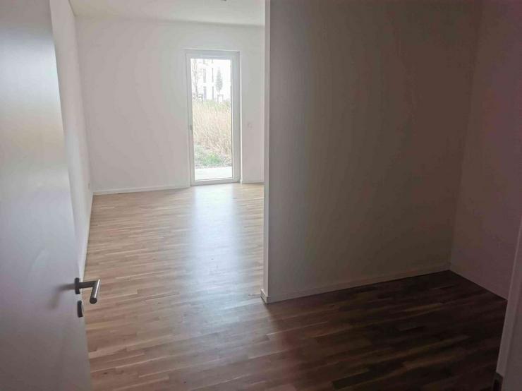 Wohnung mit Terrasse und Garten/Rasenanteil