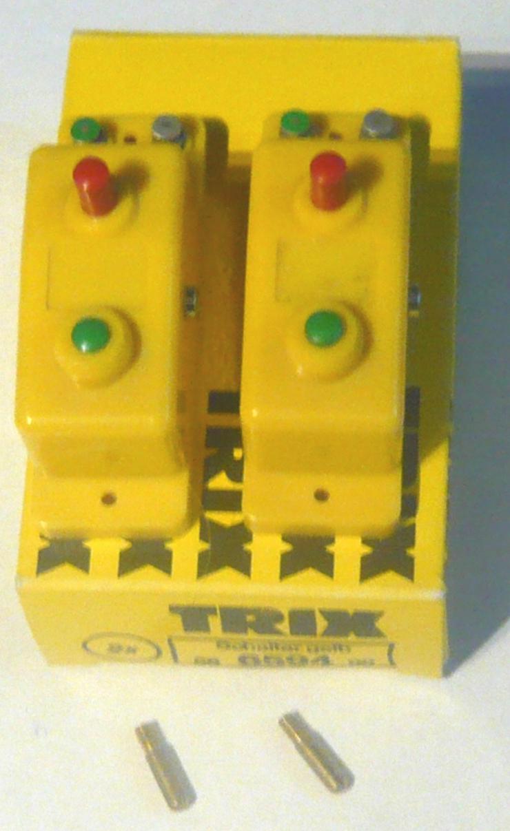 Bild 6: TRIX 4 gelbe Schalter Drucktasten Doppelfunktion Umschalter