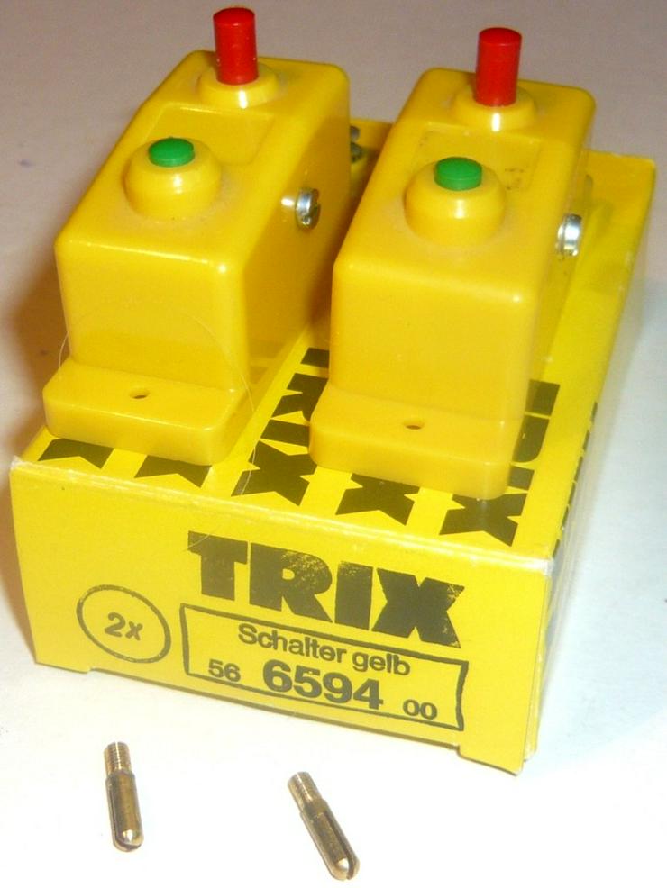 Bild 4: TRIX 4 gelbe Schalter Drucktasten Doppelfunktion Umschalter