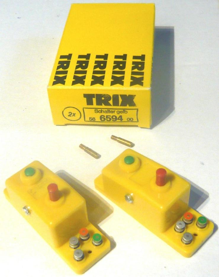 Bild 5: TRIX 4 gelbe Schalter Drucktasten Doppelfunktion Umschalter