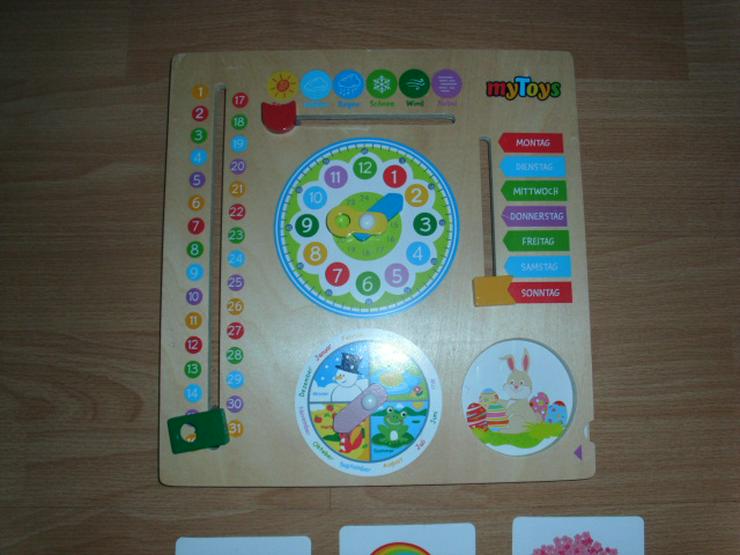 Bild 2: Lerntafel von MyToys, Holz für Uhrzeit, Datum Monate usw.